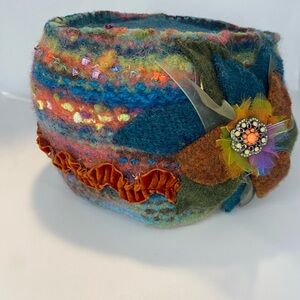 Vintage Winter Hat with Floral Detail. Made from recycled clothing.